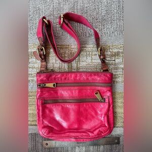 Fossil women’s Explorer red leather crossbody bag